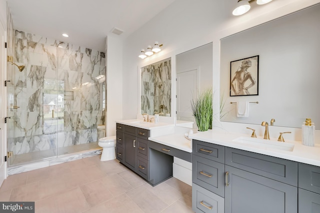 bathroom featuring a shower with door, toilet, tile patterned floors, and vanity