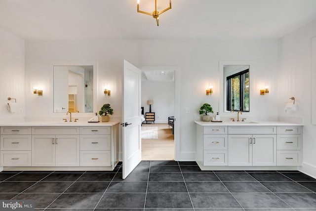 bathroom featuring vanity and tile patterned flooring