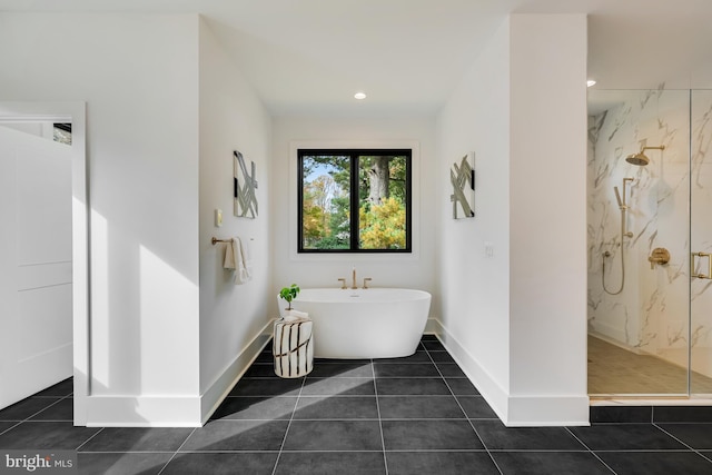 bathroom with tile patterned flooring and plus walk in shower