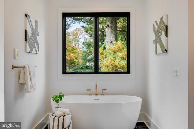 bathroom featuring a tub