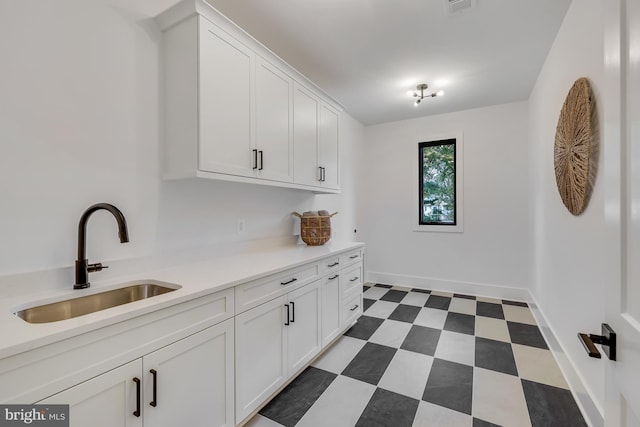 laundry area featuring sink