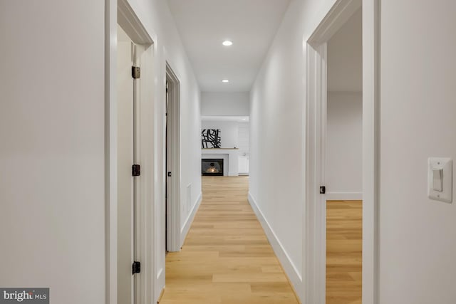 corridor featuring light wood-type flooring