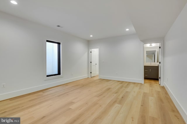 unfurnished room featuring light wood-type flooring