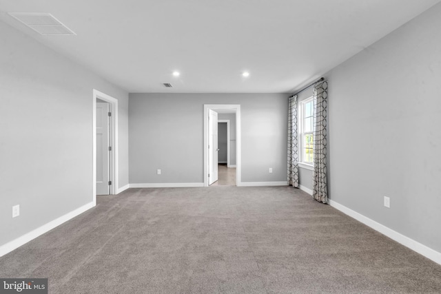 view of carpeted spare room