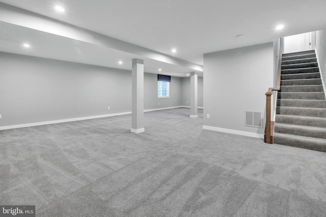 basement with carpet flooring