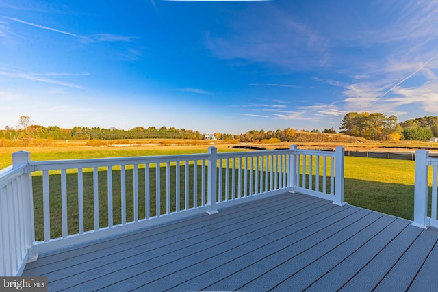 deck featuring a lawn