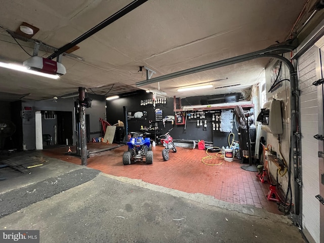 334 Mcknight St, Reading, PA 19601 - garage featuring a garage door opener