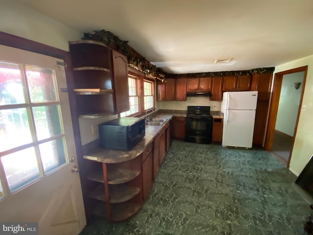 kitchen featuring black appliances and sink