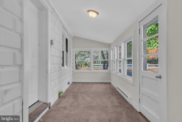 unfurnished sunroom featuring lofted ceiling and a baseboard heating unit