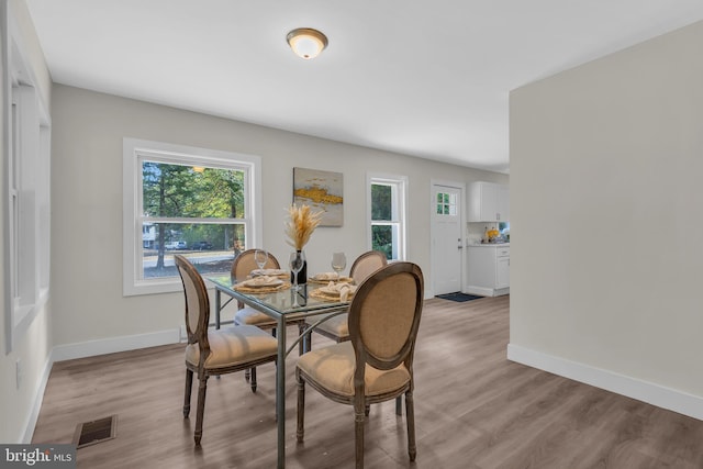 dining room featuring light wood-type flooring