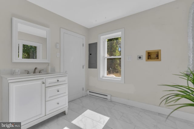 bathroom featuring vanity, electric panel, and a baseboard radiator