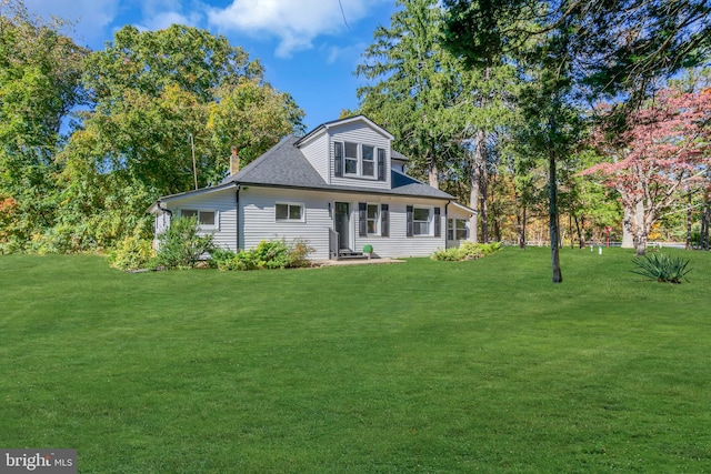 exterior space featuring a lawn