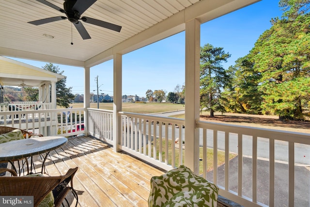 wooden terrace with ceiling fan