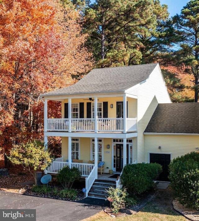 view of front of home featuring a balcony