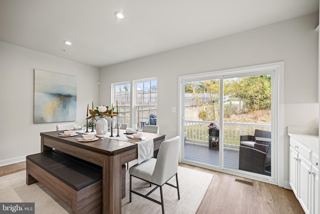 dining area with light wood-type flooring