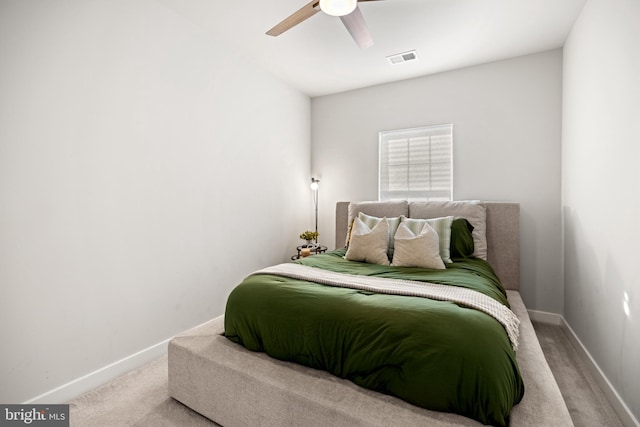 bedroom featuring ceiling fan and carpet floors