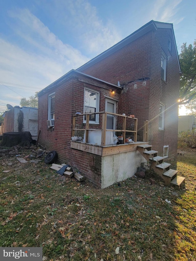 view of side of home with cooling unit