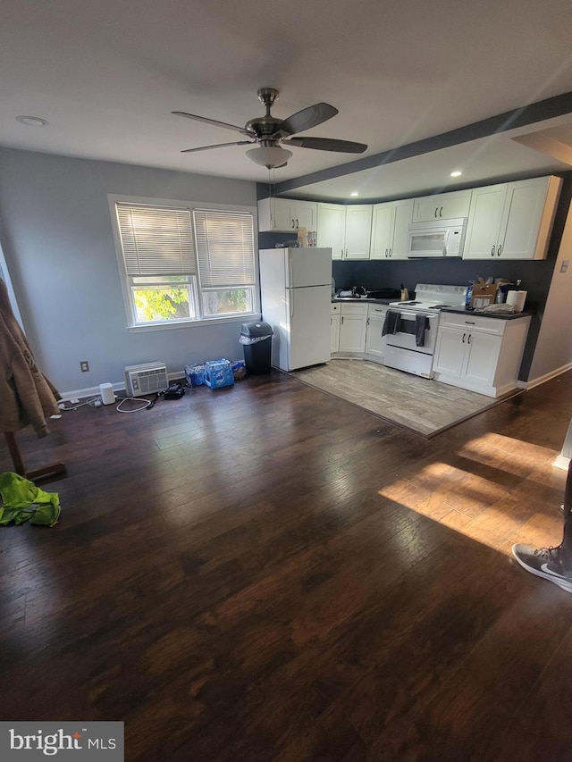 kitchen with white cabinetry, sink, ceiling fan, white appliances, and dark hardwood / wood-style flooring