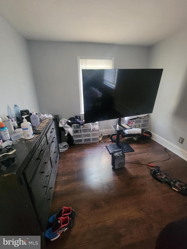 interior space with dark hardwood / wood-style flooring