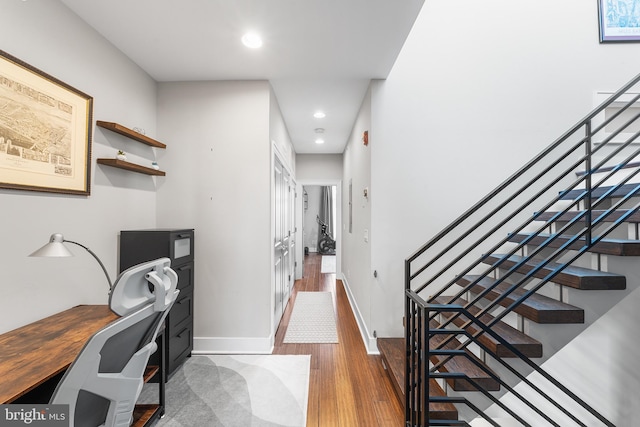 office space with dark wood-type flooring