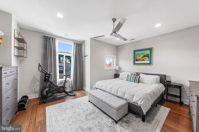 bedroom featuring dark wood-type flooring and ceiling fan