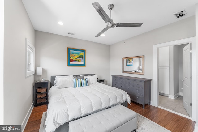 bedroom featuring hardwood / wood-style floors and ceiling fan