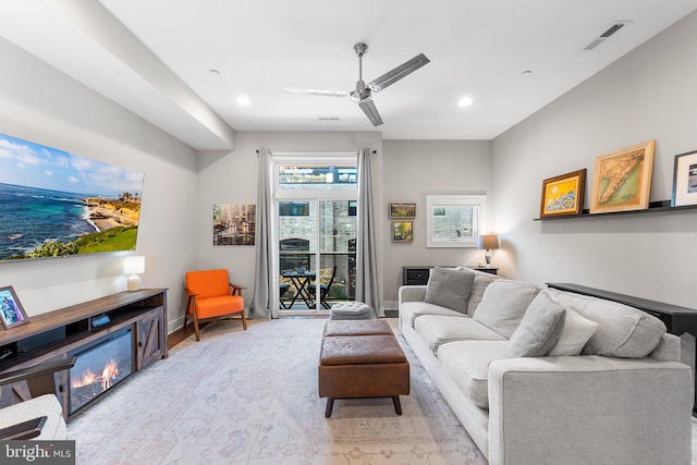 living room featuring ceiling fan