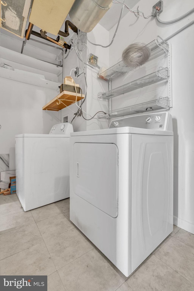 laundry area featuring washing machine and dryer