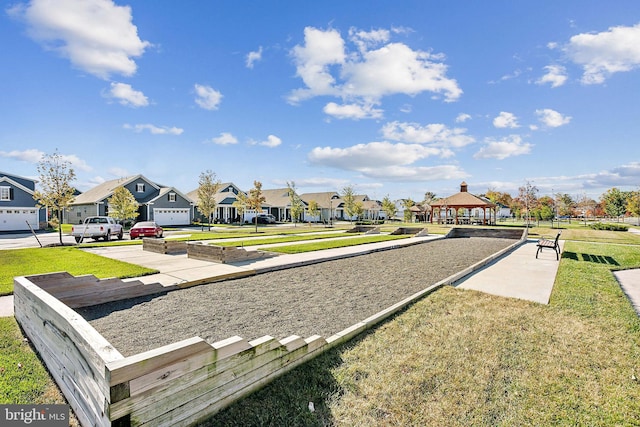 view of community with a yard