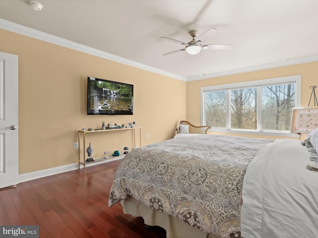 bedroom with a ceiling fan, wood-type flooring, ornamental molding, and baseboards