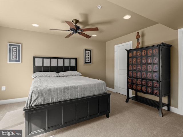 bedroom with light carpet, baseboards, and recessed lighting