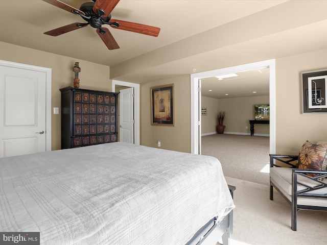 bedroom featuring carpet, baseboards, and ceiling fan