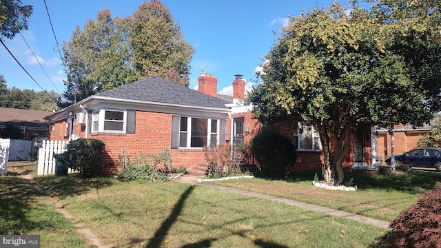 bungalow with a front yard