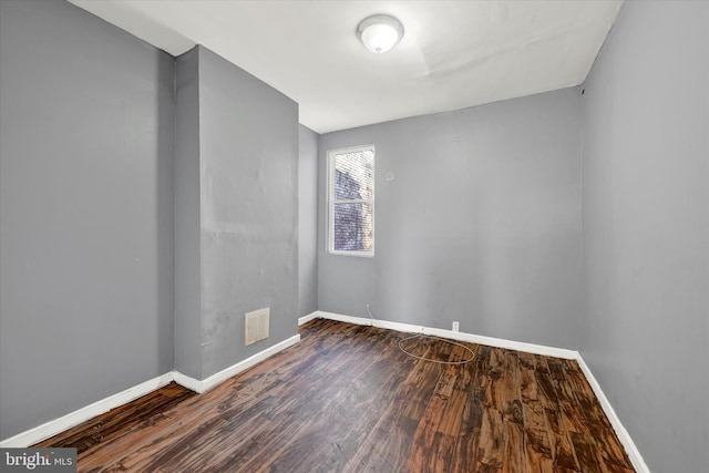 1311 N Luzerne Ave, Baltimore, MD 21213 - spare room featuring visible vents, wood finished floors, and baseboards