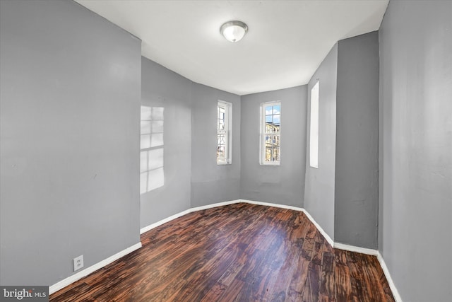 1311 N Luzerne Ave, Baltimore, MD 21213 - spare room featuring wood finished floors and baseboards