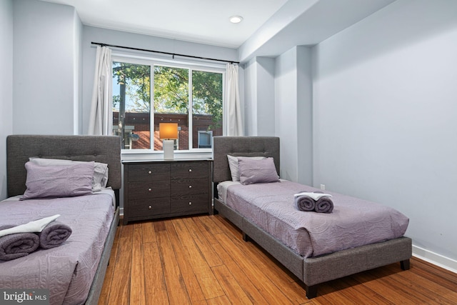 bedroom with light hardwood / wood-style flooring