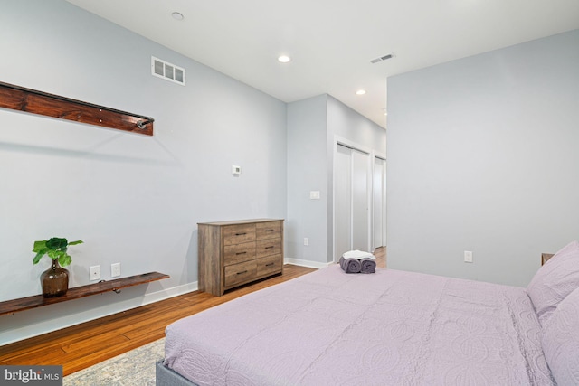 bedroom featuring light hardwood / wood-style floors