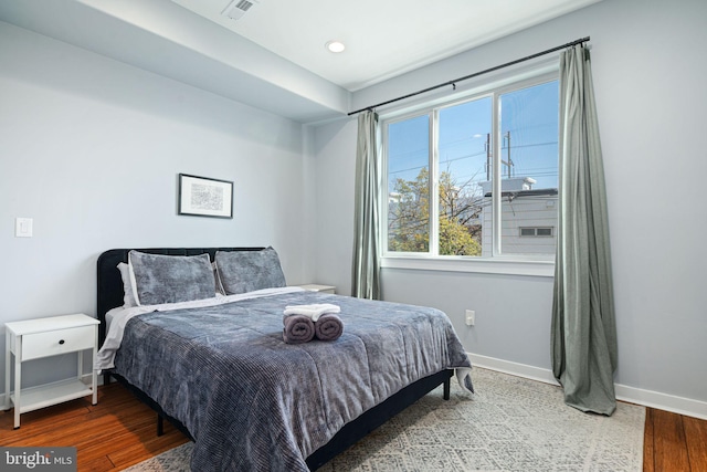 bedroom featuring hardwood / wood-style flooring