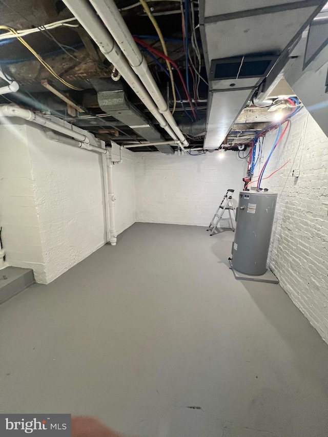 basement featuring water heater