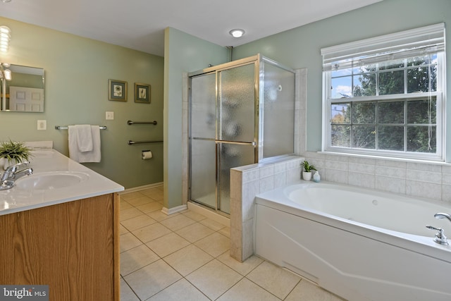 bathroom featuring tile patterned flooring, vanity, and independent shower and bath