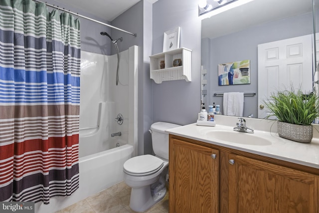 full bathroom featuring tile patterned floors, vanity, toilet, and shower / tub combo