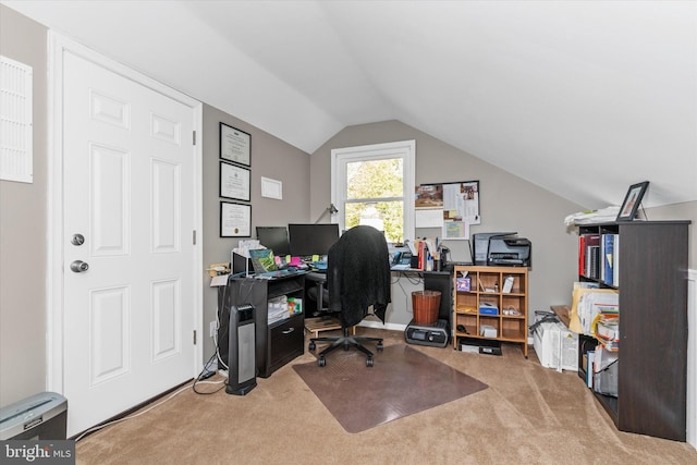 home office featuring vaulted ceiling and carpet flooring