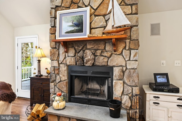 interior details with a fireplace and hardwood / wood-style floors