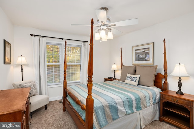 bedroom featuring ceiling fan and light colored carpet