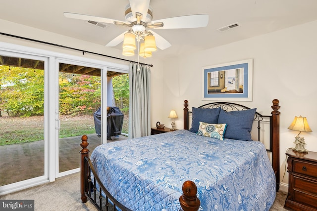 bedroom with access to outside, multiple windows, carpet floors, and ceiling fan