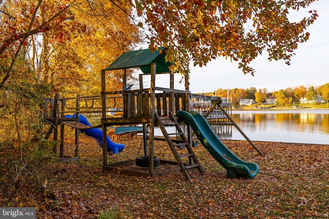 view of jungle gym featuring a water view