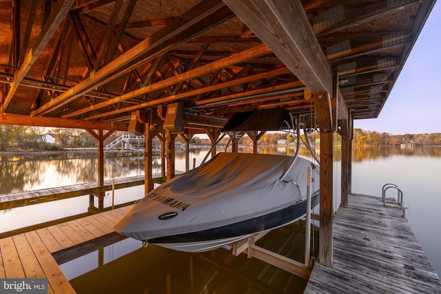 dock area with a water view