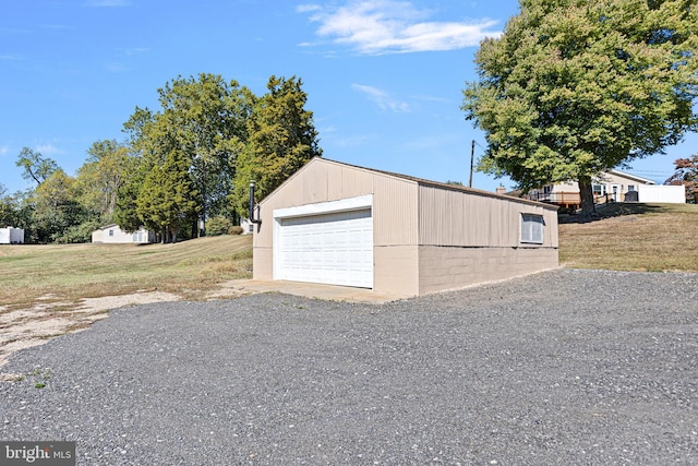 garage with a yard