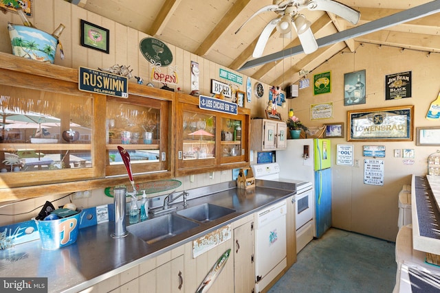 kitchen with stainless steel counters, lofted ceiling with beams, white cabinetry, and white appliances