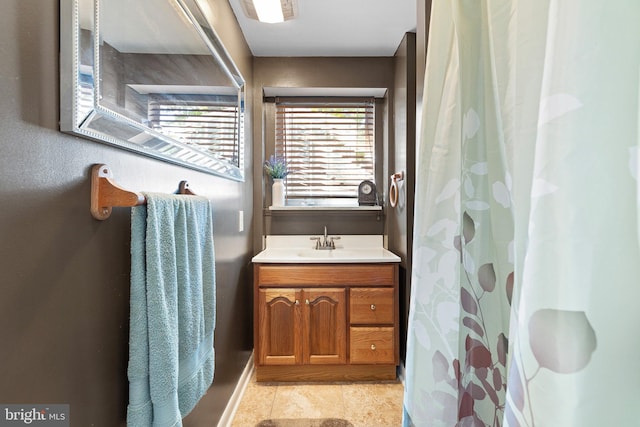 bathroom with vanity and a shower with curtain